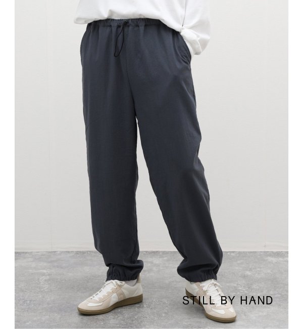 【STILL BY HAND / スティルバイハンド】Zipped hem nylon pants PT02233