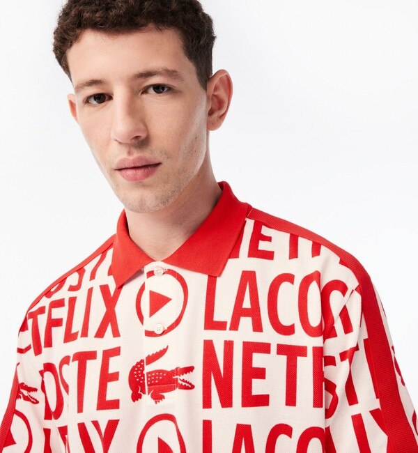 Lacoste x Netflix』 オーバーサイズ総柄ポロシャツ|LACOSTE(ラコステ 