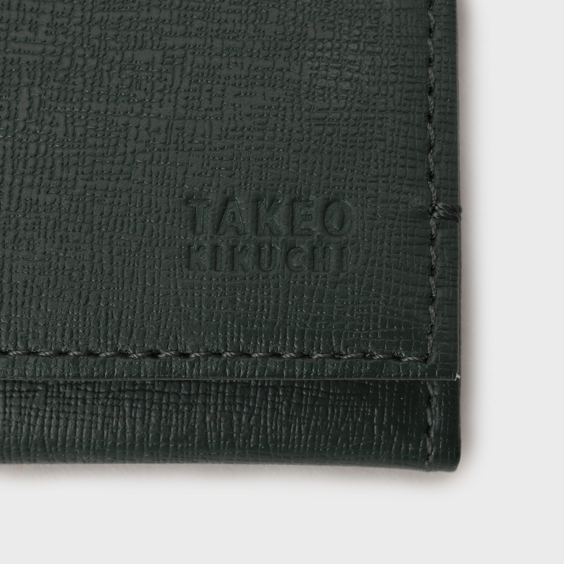 カード収納に強い】配色型押しレザー長財布|TAKEO KIKUCHI