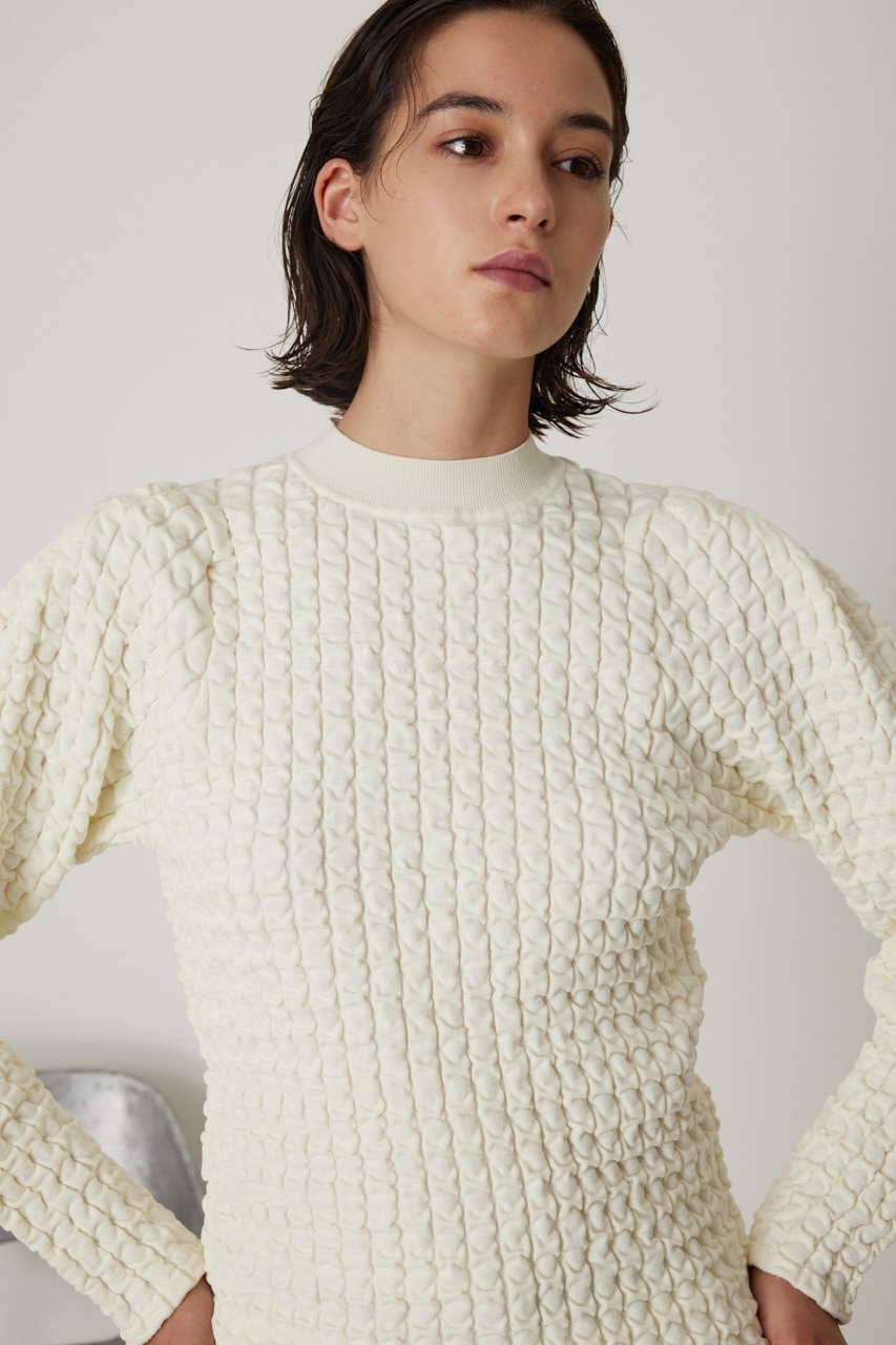 Uneven surface compact knit
