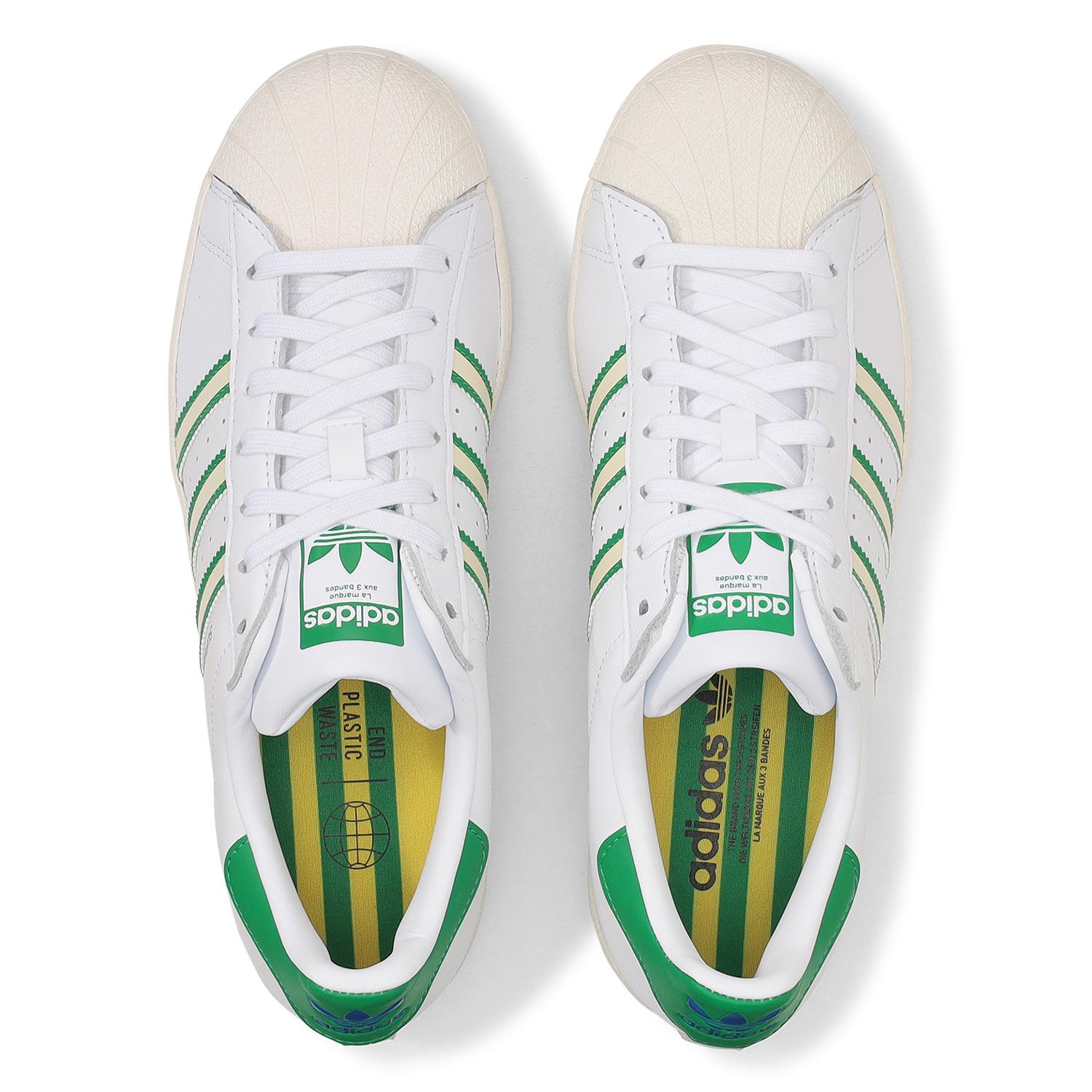 Adidas superstar clearance with green stripes